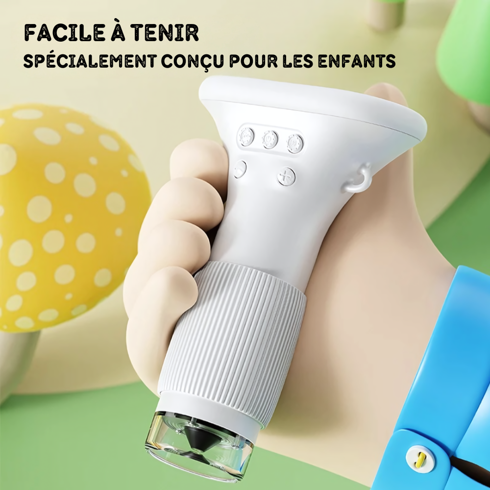 Enfant utilisant le microscope numérique portable pour observer un objet de près
